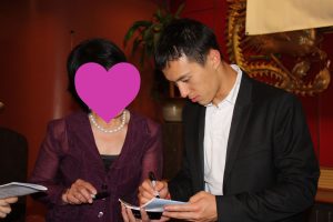 Patrick Chan fan Happylife getting his autograph at a fundraising dinner, May 2012