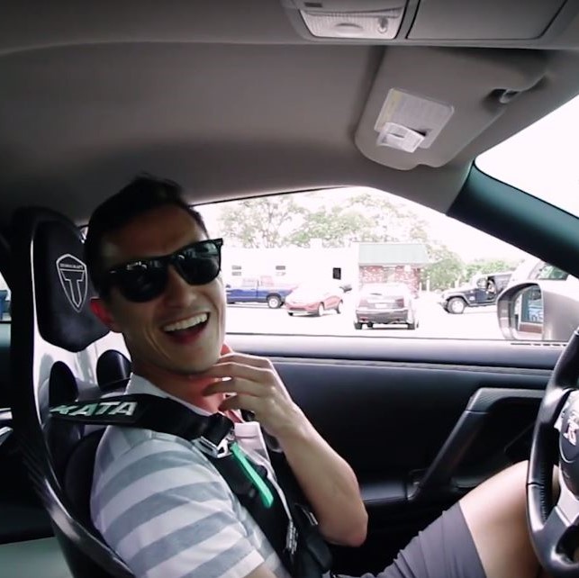 Patrick Chan laughs while showing off his luxury Nissan GT-R that used to belong to the late actor Paul Walker.