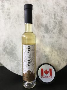 Patrick Chan Icewine Purchased by PCSkatingFan, May 2017 (pictured with souvenir hockey puck). Photo by PCSkatingFan.com