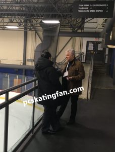 Skate Canada High Performance Director Mike Slipchuk speaks with Patrick Chan's parents after a practice session on January 12, 2018. (Photo by pcskatingfan.com)